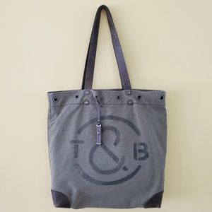 Fun Boho Rustic Tote with Grommets and Leather Straps from Nordstrom.